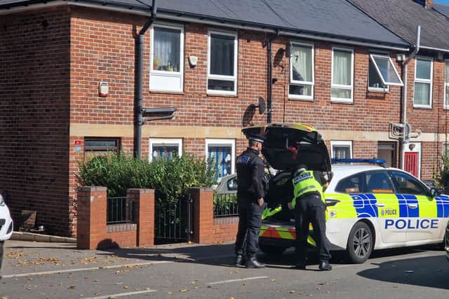 Police packing away the cordon at Horninglow Road, near Longley Park. Photo: Finn Smith, Iconic Media