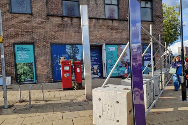 Hoardings go up in front of the former HSBC and Sainsbury's building, a landmark near Glossop Road on the Sheffield ring road. Photo: David Kessen, Iconic Media