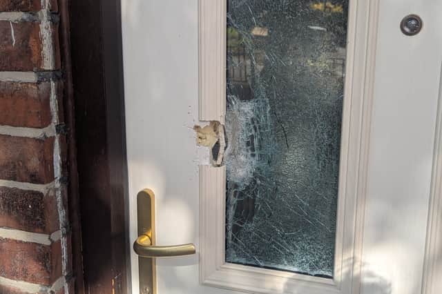 Pictures show the bullet holes caused in a shooting which damaged a house near Longley park in the early hours of the morning. Photo: Iconic Media