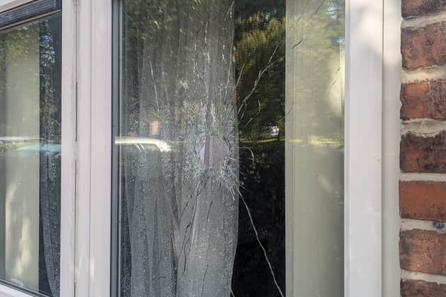Pictures show the bullet holes caused in a shooting which damaged a house near Longley park in the early hours of the morning. Photo: Iconic Media