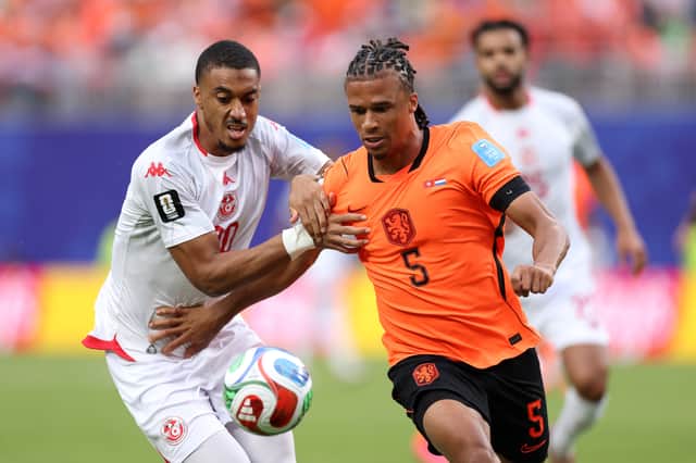 Yan Valery (left) represented Tunisia at the World Cup during the summer.