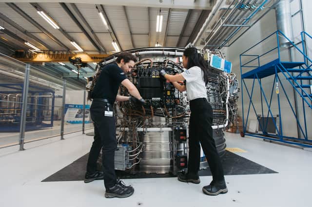 AMRC engineers work on a Rolls-Royce aircraft engine.