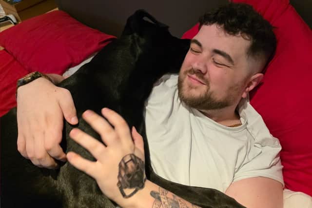 John Smith with the family dog.