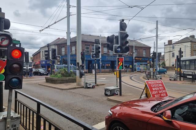 Traffic on Holme Lane in the Hillsborough area of Sheffield has been described as "chaos" by a local councillor as temporary traffic lights are leaving the street gridlocked