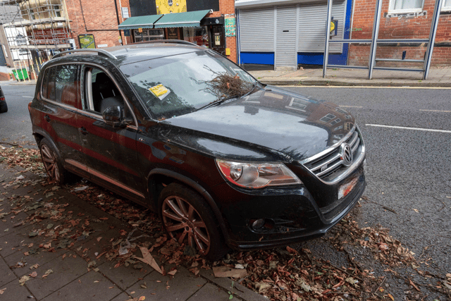 Abandoned VW with smashed window on Duke Street, Park Hill.