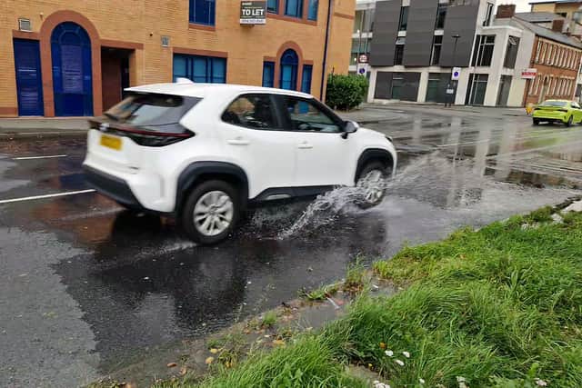 Drinking water continues to wash across St Mary's Road in Sheffield.