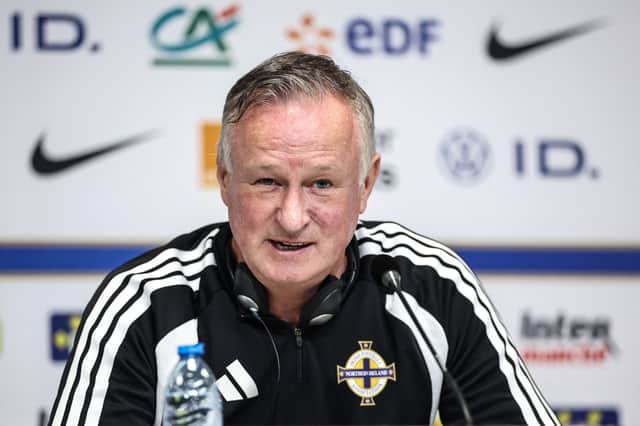 Michael O’Neill will watch his side take on Georgia on Friday teatime.