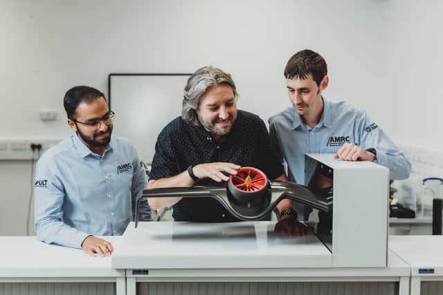 Prof David King and AMRC colleagues examine advanced technology at the University of Sheffield AMRC.