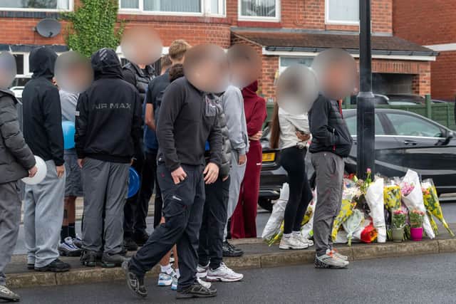 Mourners have gathered and left flowers on East Bawtry Road after a fatal collision