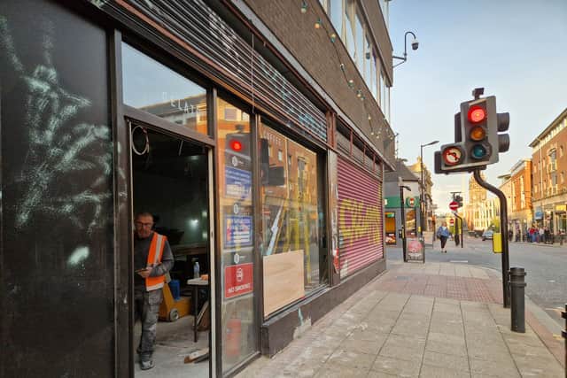 Workmen have started transforming the former Creams ice cream parlour into a Fat Hippo restaurant. Photo: David Kessen, Iconic Media