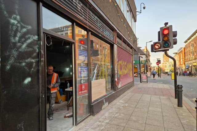 Workmen have started transforming the former Creams ice cream parlour into a Fat Hippo restaurant. Photo: David Kessen, Iconic Media