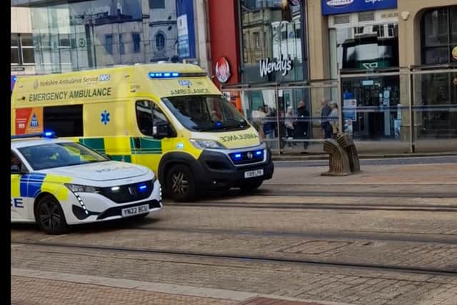 Police and an ambulance on the scene after the incident at Sainbury's on High Street, Sheffield, which saw a man injured by a collapsed ceiling. Photo: David Kessen, Iconic Media