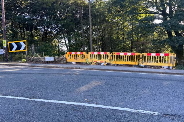 The wall on Hathersage Road, Longshaw, has been flattened again.