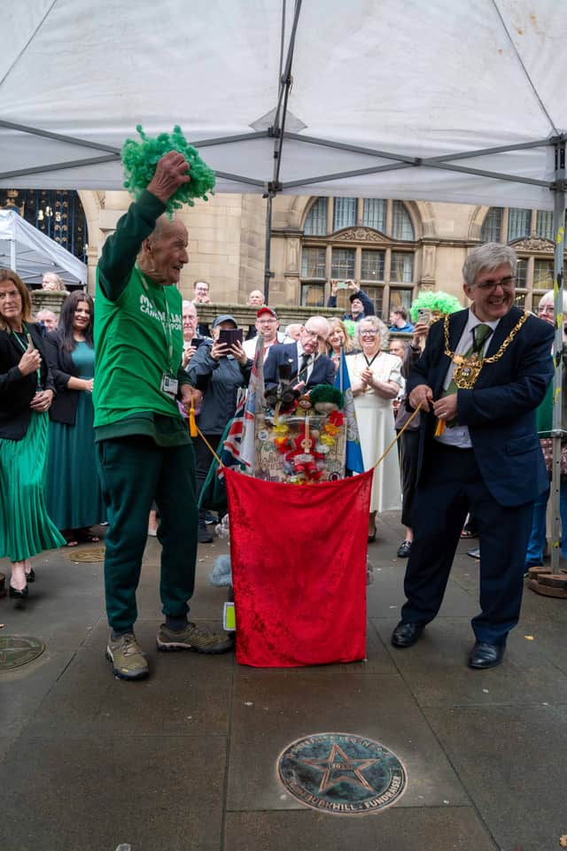 The plaque is unveiled with the help of Lord Mayor of Sheffield Andrew Sangar.