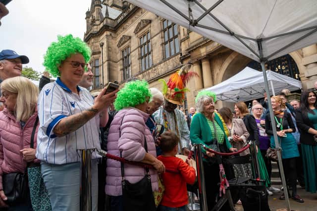 Hundreds of John's fans, family and closest friends came out to see him honoured, with a number donning their own green wigs for the occasion.