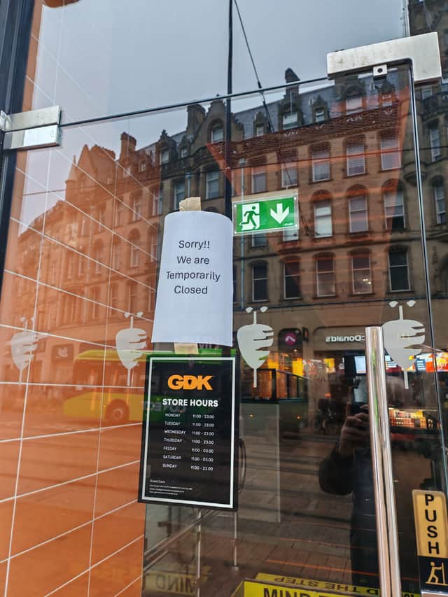A sign on the door of German Doner Kebab
