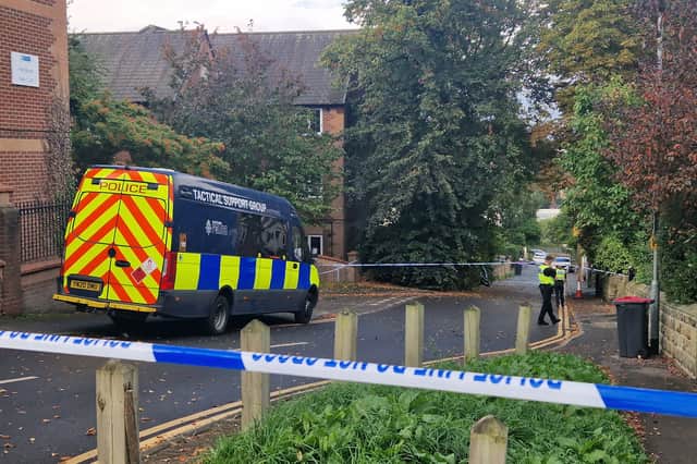 Police on the scene the morning after an explosion on Clifton Mount.