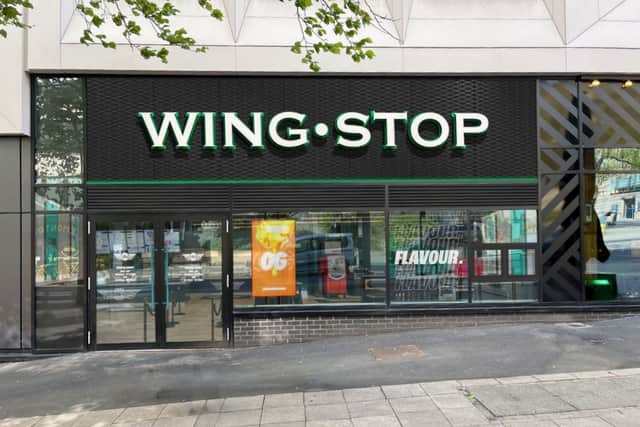Artists impression shows how a new Wingstop restaurant would look in the former Gaumont cinema building on Barker's Pool, Sheffield. Photo: Ashleigh Signs