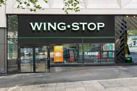 Artists impression shows how a new Wingstop restaurant would look in the former Gaumont cinema building on Barker's Pool, Sheffield. Photo: Ashleigh Signs