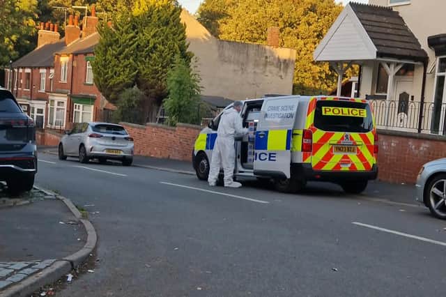 Police scene of crime officers in Darnall after the shooting