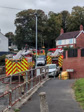 Firefighters at Dalton Lane, Rotherham this morning, after a fire led to a road closure. Photo: Joe Cawthorn, Iconic Media