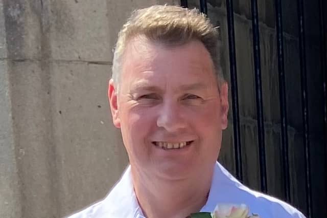 Ian Findlay, 51, died at work when a car he was repairing fell on top of him, an inquest has revealed.