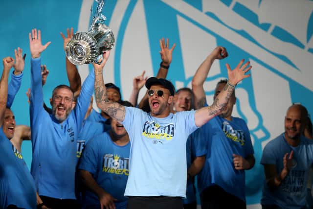 Kyle Walker holds the FA Cup in 2023.