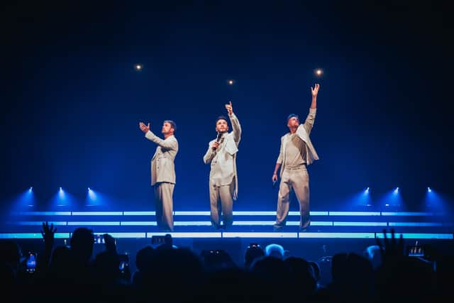 Seeing the band adorn all-white suits was life stepping back in time