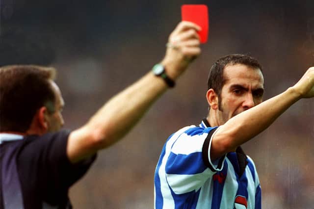 The football world stopped as Paolo Di Canio came together with referee Paul Alcock.