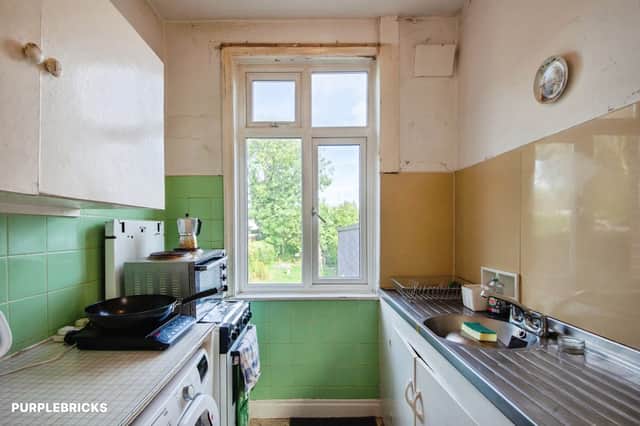 The ground-floor kitchen forms part of a refurbishment project offering buyers scope to create a home to their own taste