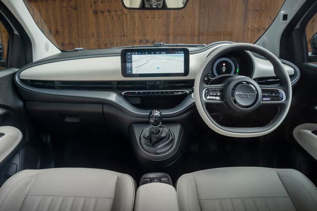The interior is lovely, and a manual gearbox suits it - although the ergonomics are still a tad iffy