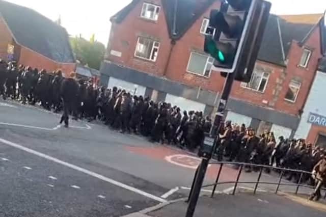 A group of people believed to be associated with Patriot Platform marched through the streets of Darnall, in Sheffield, on Sunday, October 11