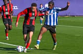 Joel Akpobi in action against Huddersfield Town under-21s.