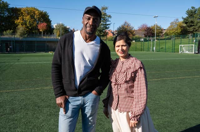 Simon and Mehrun celebrate 30 years of FURD, which stands for 'Football Unites, Racism Divides'.