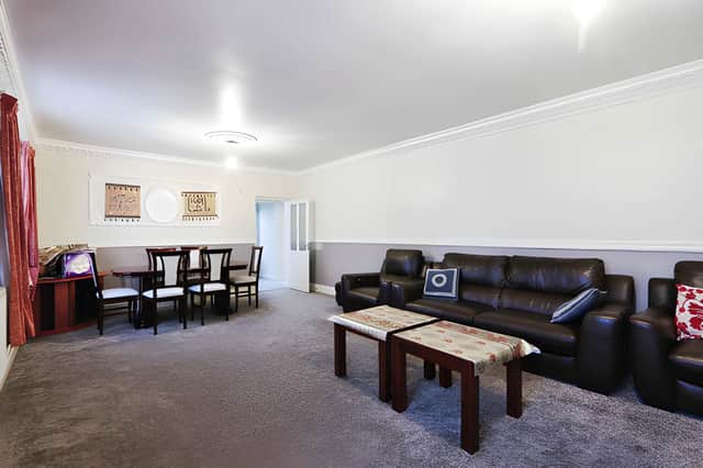 Measuring 7.59m by 4.39m, the main lounge provides generous space for relaxing and entertaining, complemented by a separate dining room and an additional reception area