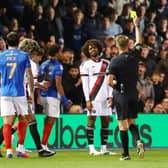 Hamza Choudrouy of Sheffield United receives a yellow card during the Portsmouth vs Sheffield United Sky Bet Championship match at Fratton Park, Portsmouth.  Paul Terry / Sportimage