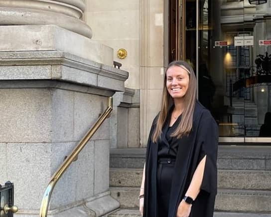 Kristi Boyes quit her £110,000 a year lawyer job and moved back in with her parents after 12-hour days left her with severe burnout. Kristi on the day she was admitted to the roll. Photo: Kristi Boyes / SWNS