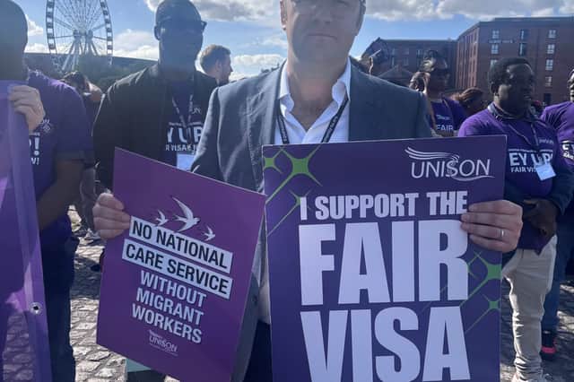 Coun Rusling said a group of the careworkers were dressed in prison uniforms tied to balls and chains, saying you need to break this chain, at a rally outside Labour party conference.