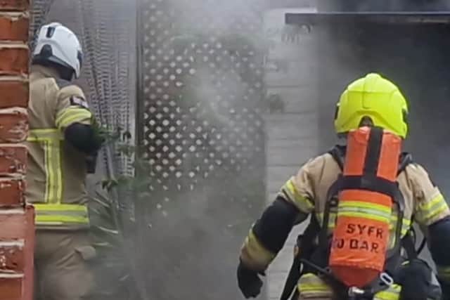 File pictures show South Yorkshire Fire and Rescue Service dealing with a fire in Sheffield. Photo: David Kessen, Iconic Media