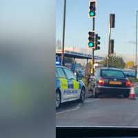 Car crashes into traffic lights on busy road to Meadowhall