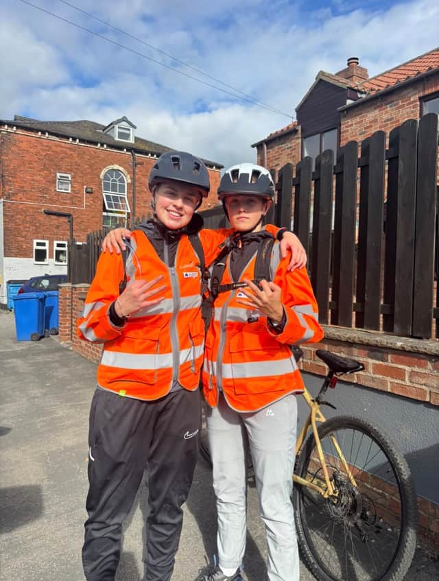 Maisie Everitt (right), and her friend Talia (left) completed a major 90 mile bike ride challenge to raise money for their friends terminally ill mum