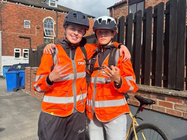 Maisie Everitt (right), and her friend Talia (left) completed a major 90 mile bike ride challenge to raise money for their friends terminally ill mum.