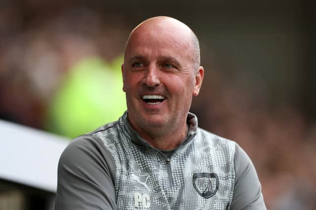 Louie Marsh is excelling under Chesterfield boss Paul Cook (pictured).