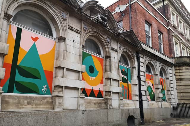 Artist Zoe Genders' work on the former Curzon Cinema is one of a number of projects helping to add colour and creativity to the city.