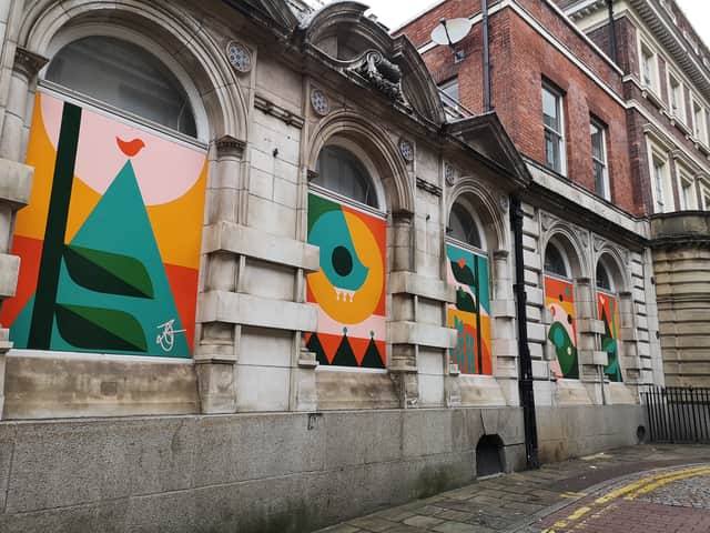 Artist Zoe Genders' work on the former Curzon Cinema is one of a number of projects helping to add colour and creativity to George Street.