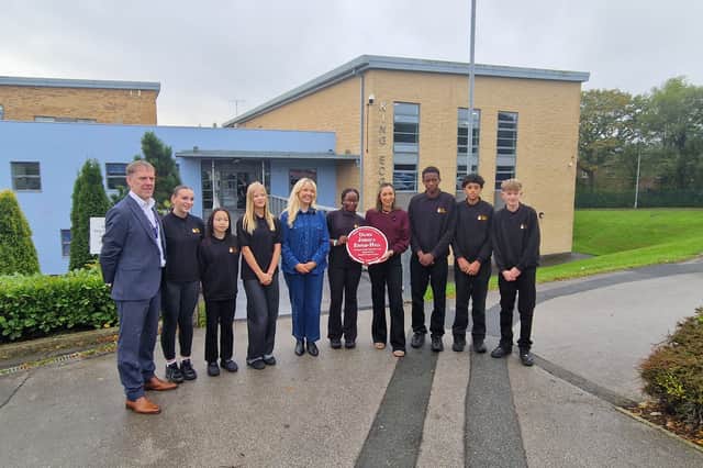 Dame Jess, Headteacher Paul Haigh and 93% Club Sophie Pender with pupils