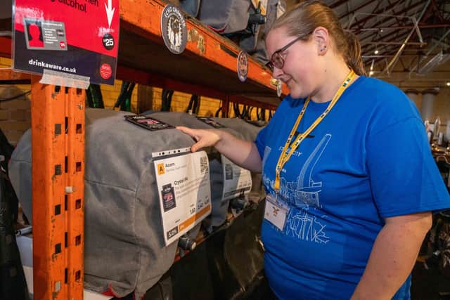 Zoe Sumner-Welch labels barrels that have been settling ahead of Steel City 50 Beer & Cider Festival at Kelham Island Museum.