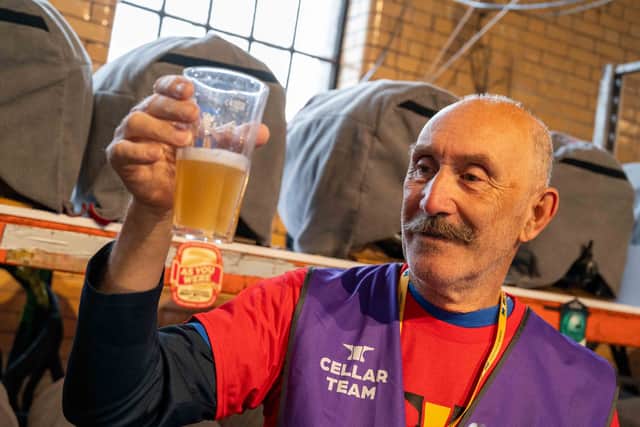 Robert Douglas checking a cloudy IPA for the Steel City 50 beer festival at Kelham Island Museum.