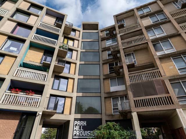 The contrast between the old and new blocks is stark