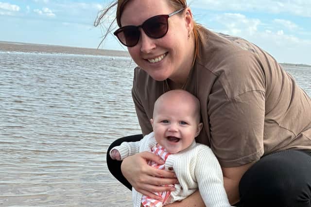 Courtney Allen-Woodger with her daughter Ellora.